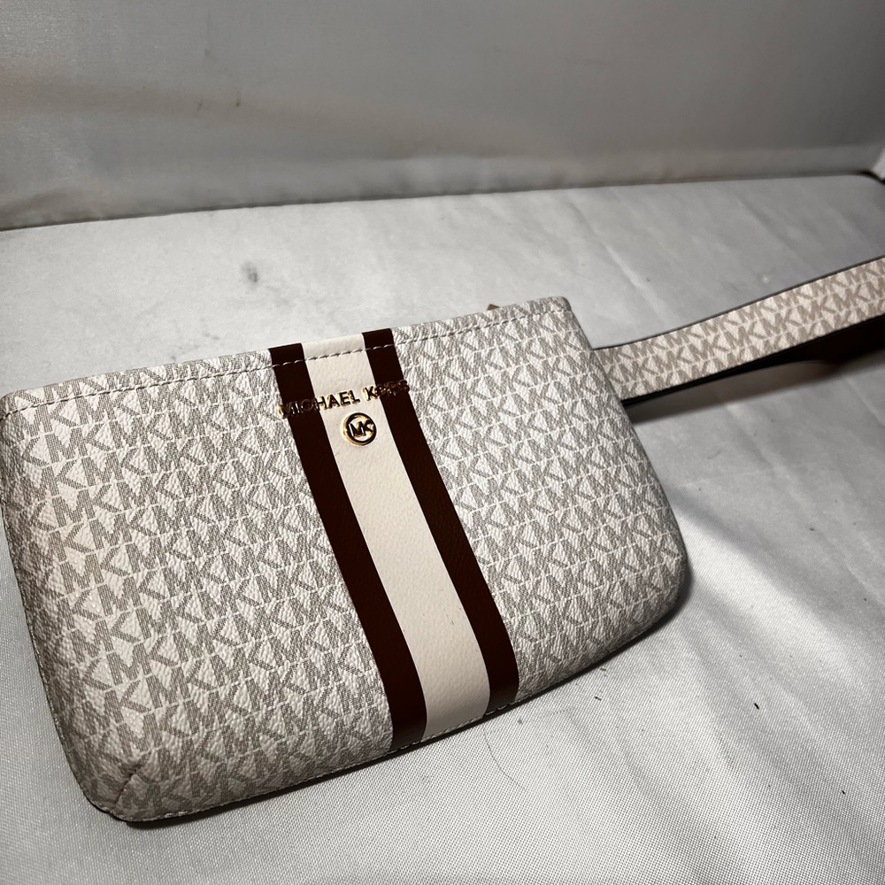 Like new Michael Kors Monogram Cream and Brown Fanny pack